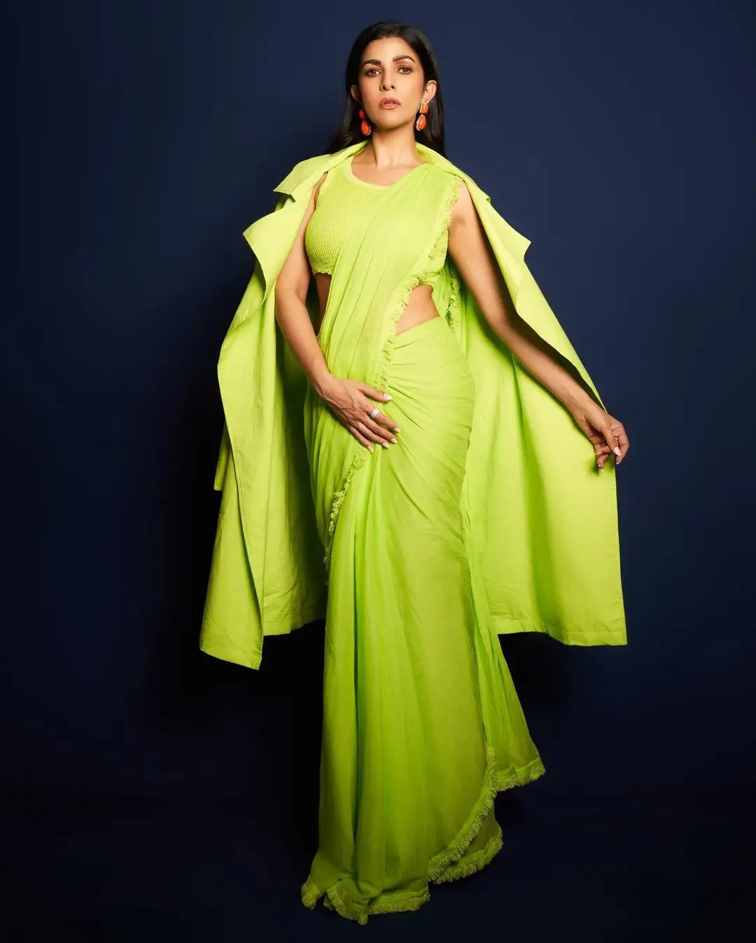 Bollywood Actress Nimrat Kaur Stills In Green Saree